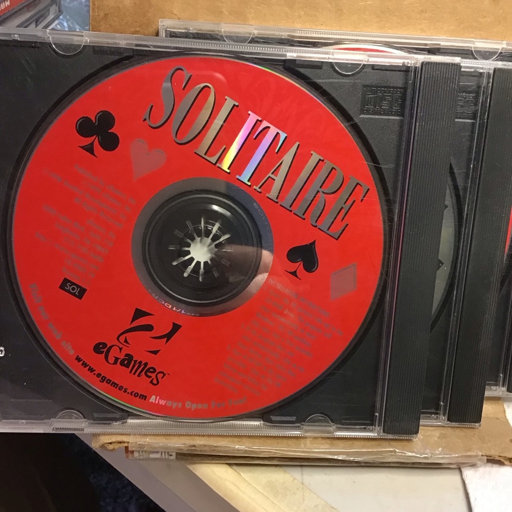 3 eGAMES  …  all 3 with hard plastic sleeve